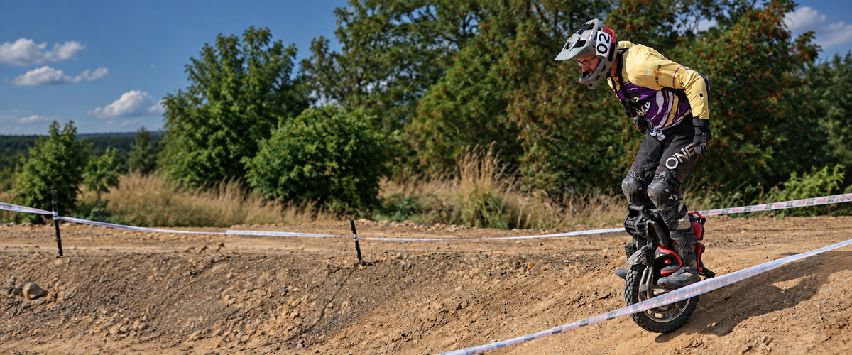 KingSong rider competing on an off-road course
