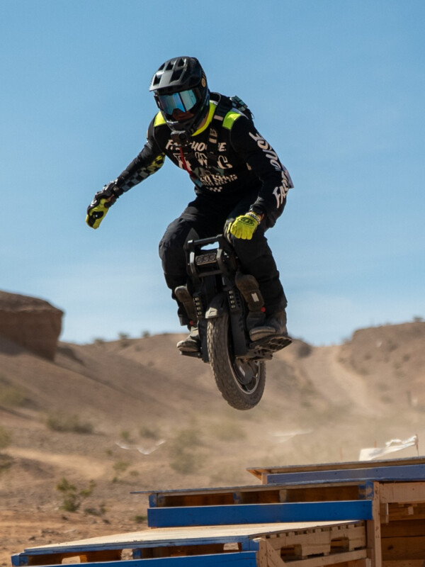 Matt Burt riding the KingSong F18 over an off-road jump